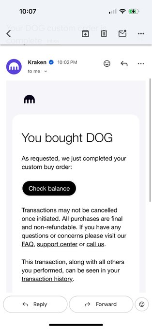 A mobile screenshot of an email from Kraken confirming a DOG cryptocurrency purchase with a 'Check balance' button.