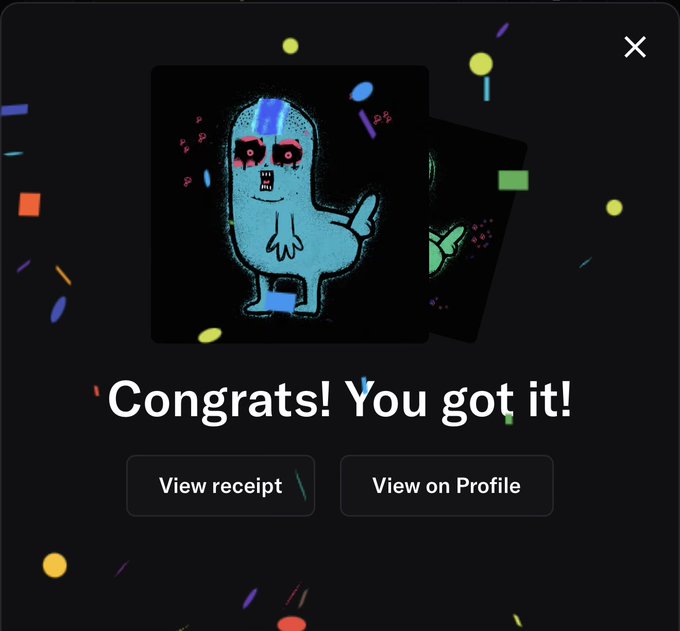 A digital 'Congrats! You got it!' notification featuring a cartoonish blue character with red-ringed eyes giving a thumbs up, with options to 'View receipt' and 'View on Profile' below.