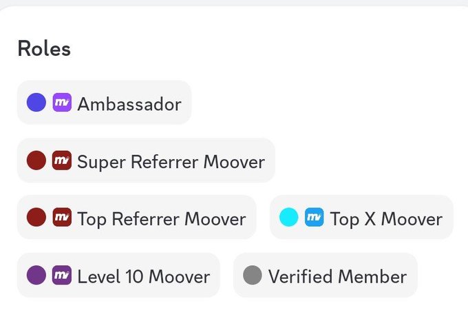 A screenshot of a "Roles" section displays a collection of earned badges, including "Ambassador" (highlighted with a purple dot), "Super Referrer Moover," "Top Referrer Moover," "Top X Moover," "Level 10 Moover," and "Verified Member," visually celebrating the achievements mentioned in the post. The highlighted "Ambassador" role directly corresponds to the user's excitement about becoming an official Ambassador for @moovexyz.