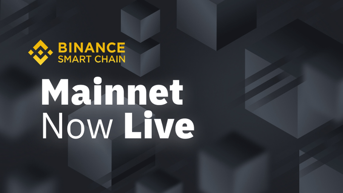 A promotional graphic for Binance Smart Chain announcing "Mainnet Now Live" with the Binance Smart Chain logo against a dark geometric background of 3D cubes. The image ties to the post by referencing the user's first transaction on Binance Smart Chain (now BNB Chain), which launched following this mainnet announcement.