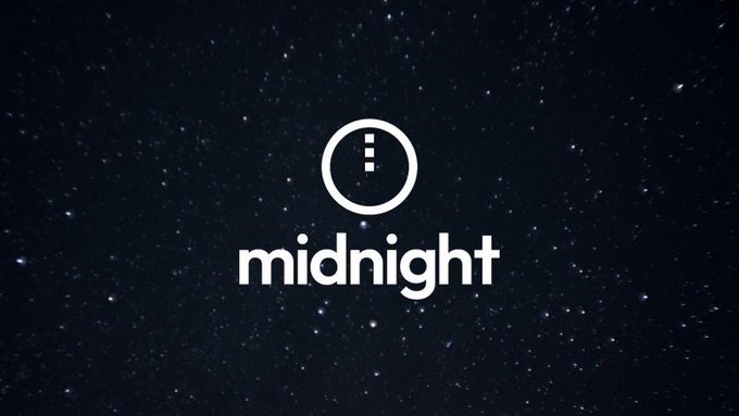 A white circular logo with two dots resembling a colon, paired with the lowercase word "midnight," is displayed against a starry night sky background—visually reinforcing the project's name and its privacy-focused branding amid the reported price surge.