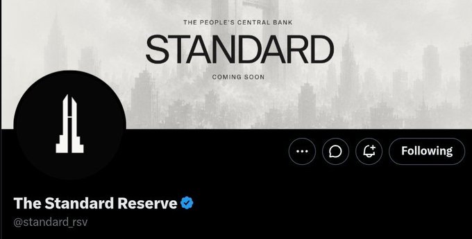 A social media profile banner for 'The Standard Reserve' (@standard_rsv) with the tagline 'THE PEOPLE'S CENTRAL BANK' and 'STANDARD COMING SOON' against a city skyline background.