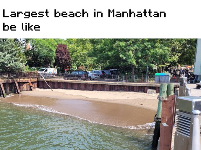 A meme captioned 'Largest beach in Manhattan be like', showing a tiny strip of sand with murky river water in an urban park setting.