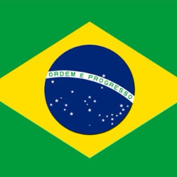 The image shows the flag of Brazil, featuring its iconic green field, yellow diamond, and blue celestial globe with the national motto "ORDEM E PROGRESSO" (Order and Progress) inscribed across a banner. The flag's display connects to the announcement about Brazil's securities regulator launching a new tokenization initiative within the country's regulatory framework.