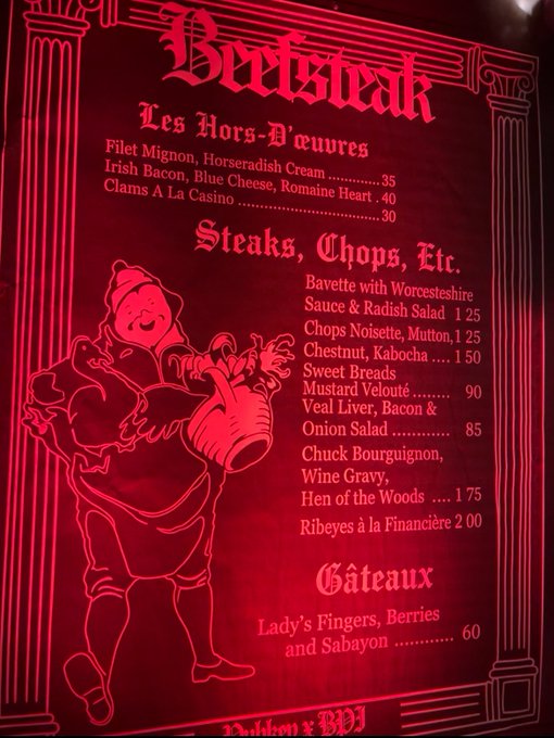 A vintage-style red menu titled 'Berksdek' featuring sections for 'Les Hors-D'œuvres' and 'Steaks, Chops, Etc.' alongside an illustration of a chef, with items like Filet Mignon for $0.35 and Hen of the Woods for $1.75.