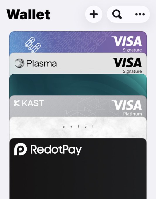 A mobile wallet app interface displaying a stack of digital cards including 'VISA Signature' (Plasma), 'VISA Platinum' (KAST), 'avicii', and a black 'RedotPay' card.