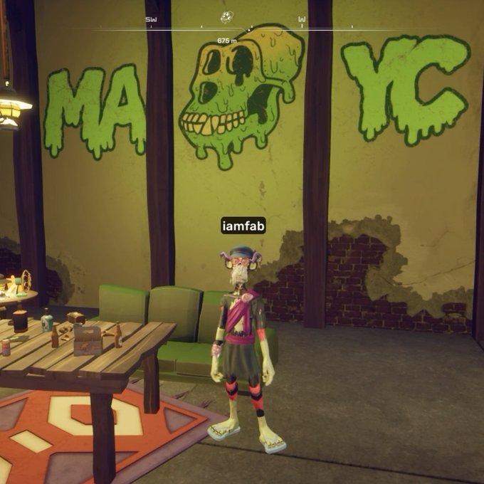 A first-person view inside a virtual game environment showing a gray-skinned character avatar named 'iamfab' standing near a graffiti wall that reads 'MAY' and 'YC' with a green skull in between.