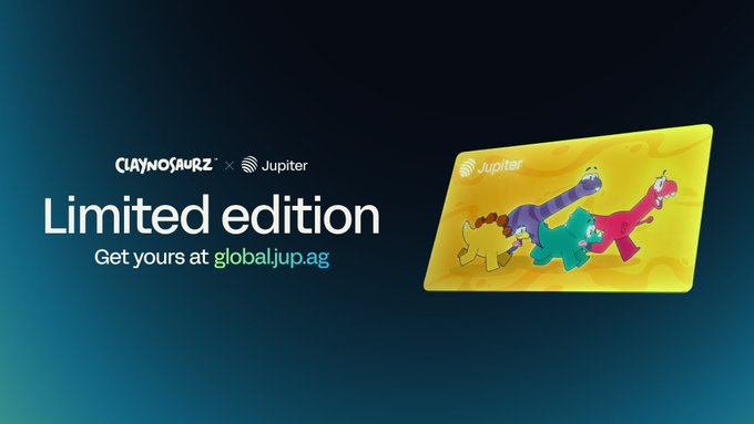 A promotional image for a collaboration between 'CLAYNOSAURZ' and 'Jupiter' displays a yellow limited edition card featuring colorful dinosaur characters, with text directing viewers to 'Get yours at global.jup.ag'.