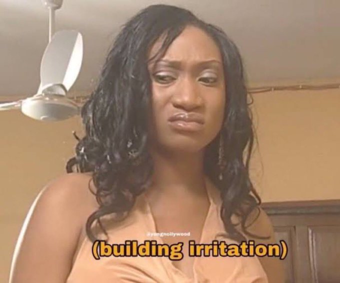 A woman with a frustrated expression appears in what looks like a scene from a Nollywood film, with the caption "(building irritation)" overlaid on the image. The accompanying post humorously uses her annoyed expression to comment on Nigerian Web3 services charging excessive fees for small transactions.