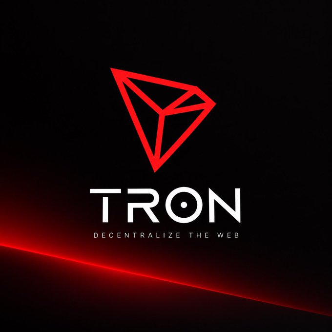 A logo for 'TRON' with the tagline 'DECENTRALIZE THE WEB' featuring a red geometric triangular symbol on a black background with red lighting accents.