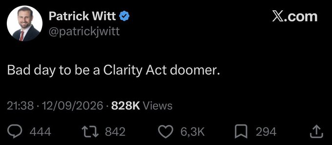 A screenshot of a tweet from verified X.com user Patrick Witt (@patrickjwitt) reading "Bad day to be a Clarity Act doomer," posted on 12/09/2026 with 828K views, 6.3K likes, and 444 replies, paired with commentary framing it as a bullish signal for the upcoming CLARITY Act vote and a potential Bitcoin breakout.