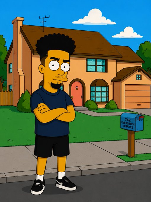 A Simpsons-style cartoon character with dark hair and a goatee stands with crossed arms on a sidewalk in front of a suburban house with a blue mailbox reading '742 EVERGREEN TERRACE'.