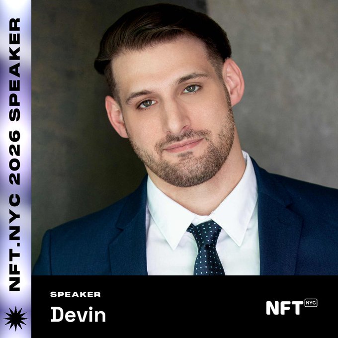 The image features a man wearing a suit and tie standing against a gray background, with the text "I'M excited to share that I'll take the stage at NFT.NYC 2026!" The man's name is displayed below him in white letters, and he has a beard.