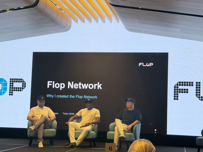 Three men sit on stage at a panel discussing "Flop Network - Why I created the Flop Network" with a Token 2049 reference visible on screen, relating to the post's mention of hearing the Flop Labs pitch in Korea and Singapore to support the network with compute and a validator.