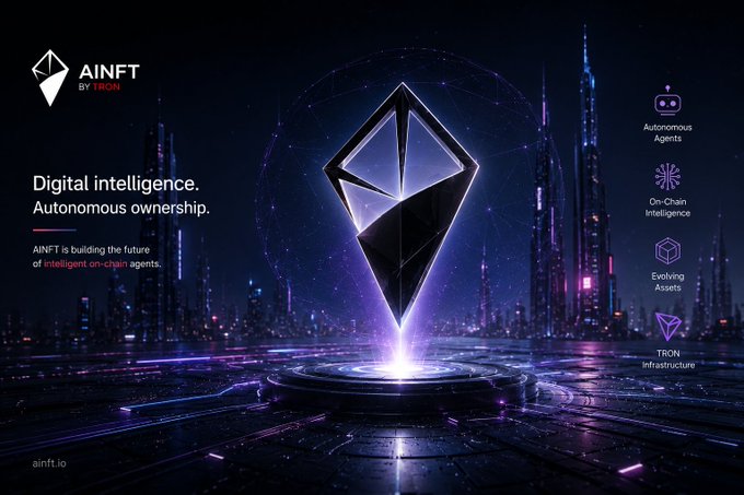 A promotional graphic for 'AINFT by TRON' with the tagline 'Digital intelligence. Autonomous ownership,' showcasing a glowing diamond-shaped crystal against a futuristic cityscape with features listed: Autonomous Agents, On-Chain Intelligence, Evolving Assets, and TRON Infrastructure.