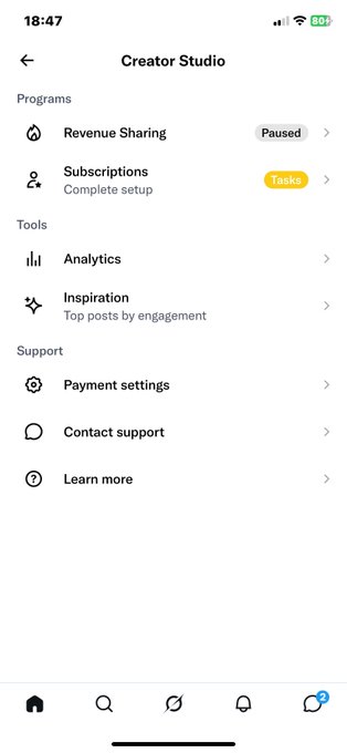 A screenshot of the Creator Studio settings page showing "Revenue Sharing" marked as "Paused" and "Subscriptions" labeled "Complete setup," reflecting the user's frustration that their creator earnings have been grayed out for six months.