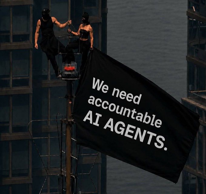 Two masked activists perch atop a structure, unfurling a large black flag that reads "We need accountable AI AGENTS." The dramatic protest imagery visually underscores the post's warning about an impending AI agent identity crisis, calling attention to the urgent need for accountability as autonomous agents proliferate.