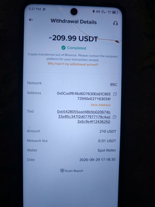 A screenshot of a Binance "Withdrawal Details" page showing a completed transaction of -209.99 USDT (210 USDT minus 0.01 USDT network fee) sent via BSC network to the address starting with 0x0CAdffE, with transaction ID 0xb5428055aad48b5b020674b33e85c3472d077977179c4ad3a5c9e4f12436250, dated 2026-09-29. The image illustrates the post's warning about device compromise—a second-hand phone with altered deposit addresses led to the $210 USDT loss shown.