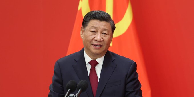 Xi Jinping stands before China's flag, a symbol of the country's recent announcement of ¥2.3 trillion in liquidity, which the post suggests is bullish for #SOLANA.