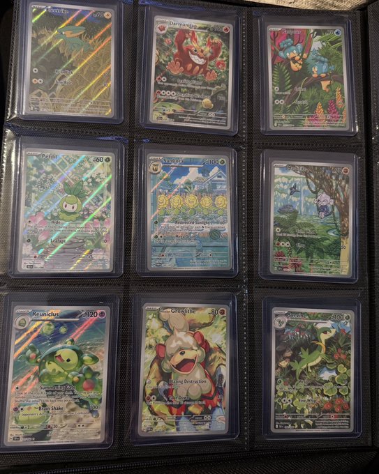 A page from a Pokémon trading card binder displaying nine holographic cards including Wattrel, Darumaka, Ivysaur, Petilil, Snorlax, Toedscruel, Reuniclus, Greavard, and Shaymin, with three rows in protective sleeves.