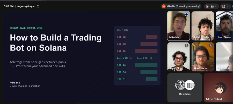 A Zoom meeting screenshot for 'Solana Fall School 2026' showing a presentation titled 'How to Build a Trading Bot on Solana' by Mike Ma, DevRel@Solana Foundation, alongside a price comparison chart and video feeds of multiple participants.