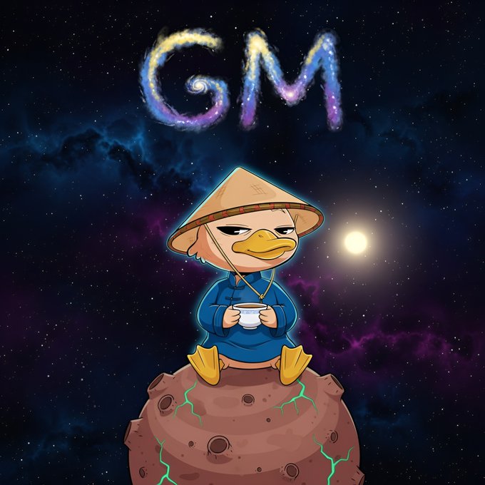 A cartoon duck wearing a conical Asian hat and blue robe sits holding a teacup on a small asteroid, with the letters 'GM' formed from a colorful galaxy against a starry purple background.
