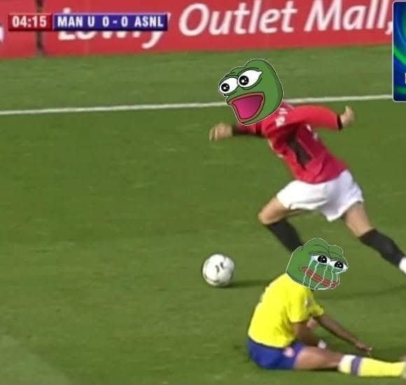 A still from a soccer match with the scoreboard showing '04:15 MAN U 0-0 ASNL' has two Pepe the Frog meme faces photoshopped over the heads of the two players, with 'Outlet Mall' and 'Energy' visible on background advertising boards.