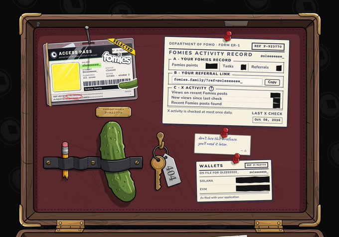 A dark maroon suitcase interior displaying a fictional "DEPARTMENT OF FOMO" file with an Access Pass, Fomies Activity Record, wallets, and a key labeled "404" for the user "goleeee".