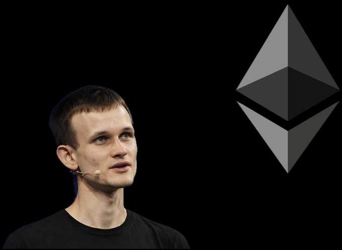 A photo of Vitalik Buterin, co-founder of Ethereum, speaking at a podium alongside the Ethereum (ETH) logo.