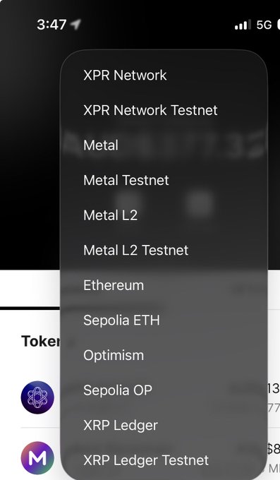 A smartphone screenshot displaying a dropdown menu of blockchain networks including XPR Network, XPR Network Testnet, Metal, Metal Testnet, Metal L2, Metal L2 Testnet, Ethereum, Sepolia ETH, Optimism, Sepolia OP, XRP Ledger, and XRP Ledger Testnet.
