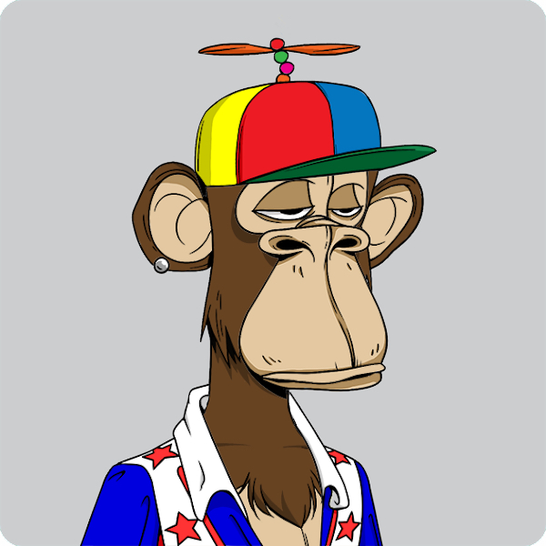 A Bored Ape-style cartoon illustration of a brown monkey wearing a propeller beanie in red, yellow, and blue, along with a stars-and-stripes patterned shirt.