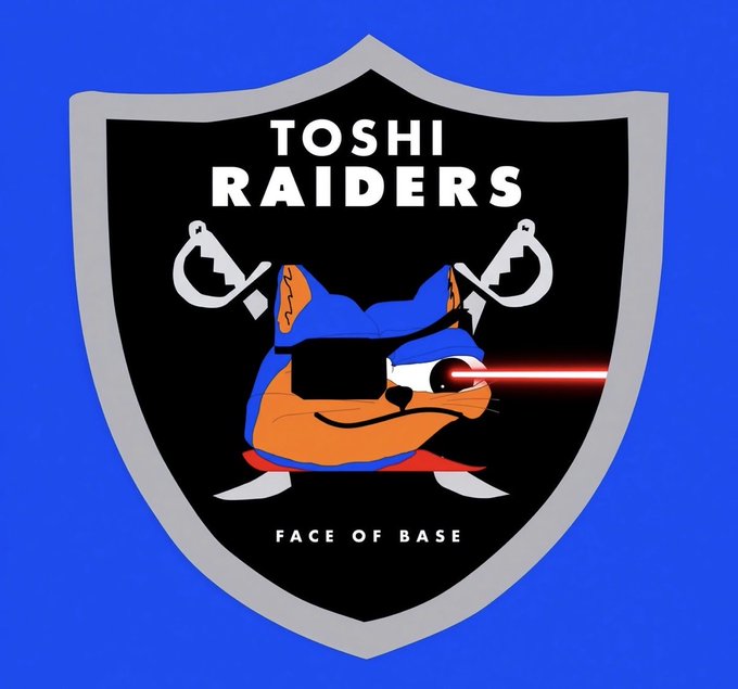 A shield-shaped emblem with a blue background reads 'TOSHI RAIDERS - FACE OF BASE' and features an orange and blue cat wearing 3D glasses with crossed wrenches behind it.