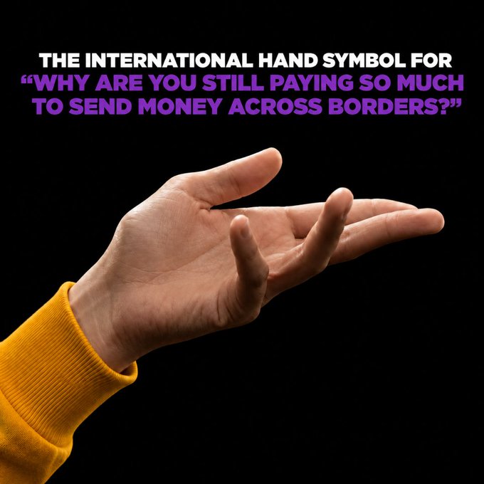 A hand extended palm-up against a black background, with text reading "THE INTERNATIONAL HAND SYMBOL FOR 'WHY ARE YOU STILL PAYING SO MUCH TO SEND MONEY ACROSS BORDERS?'". The questioning gesture reinforces the post's message about @KiiChainio offering a cheaper, simpler alternative for cross-border money transfers.