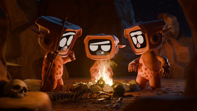 Three small, blocky cave-like characters with screen-like faces gather around a crackling campfire in a dark cave, their expressions ranging from happy to mischievous, with one holding a staff and bones scattered around them, embodying the "things heating up in the Blokyverse" caption as the fire's glow brings these quirky digital beings to life.