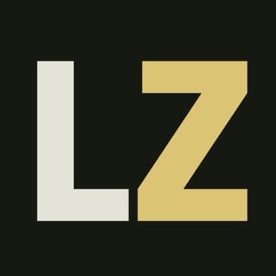 A simple graphic showing the letters 'LZ' in cream and tan colors against a black background, representing the Lazaruz or similar logo.