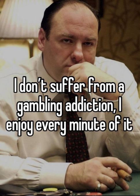 A man smoking a cigar with the text overlay: 'I don't suffer from a gambling addiction, I enjoy every minute of it'.