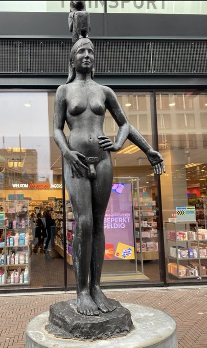 A bronze nude female statue holding what appears to be a small bird stands on a stone pedestal in front of a store with a "WELKOM" sign and "BEPERKT HELDIG" text visible. The image relates to the post's mention of "Ye $ICP" by depicting the iconic figure associated with the Internet Computer (ICP) project.

*(Note: While the post references "Ye $ICP," the statue actually appears to be a classical or artistic figure rather than a recognized ICP symbol. The connection to the caption is unclear without additional context.)*