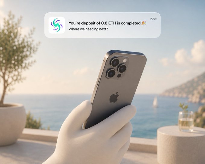 A notification from an app stating 'You're deposit of 0.8 ETH is completed 🎉 Where we heading next?' displayed over an image of a hand holding an iPhone with a Mediterranean coastal view.