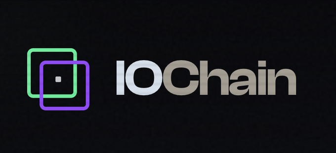 The image shows the IOChain logo featuring two overlapping rounded square outlines in green and purple with a small dot in the center, displayed in white text on a black background. This branding accompanies the announcement that IOChain won the Grand University Award at the Colosseum Solana Frontier Hackathon for their work on decentralized AI inference on Solana.
