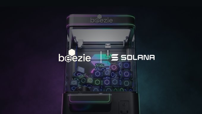 A dark, stylized product image showing an open tech case containing glowing hexagonal components, with overlaid text reading 'beezie' and 'SOLANA'.