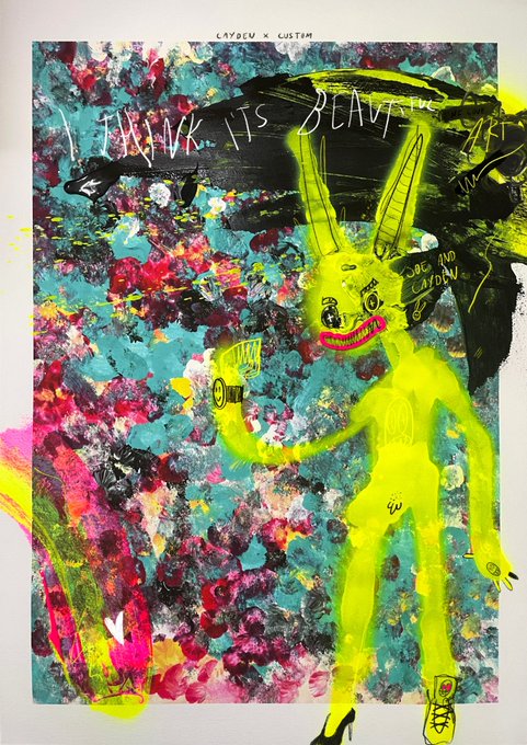 Mixed-media artwork titled "LAYDEUX X CUSTM" featuring "I THINK ITS BEAUTIFUL" text over a colorful floral abstract background with a yellow bunny-like figure drawn on top, alongside black brushstroke elements.