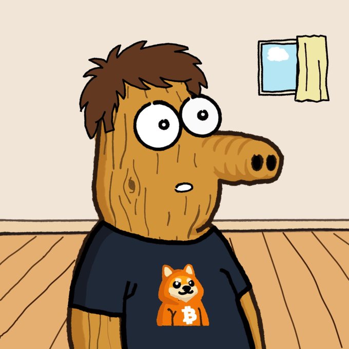A cartoon illustration of a character with a wooden, log-like head featuring an elongated snout, big googly eyes, and brown hair, wearing a navy blue t-shirt with an orange Shiba Inu dog wearing a Bitcoin necklace logo.