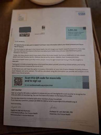 A printed letter from 'Our Future Health' addressed to a household, offering a £10 voucher for joining a health research program, containing detailed information about blood sample donation and a QR code for sign-up.