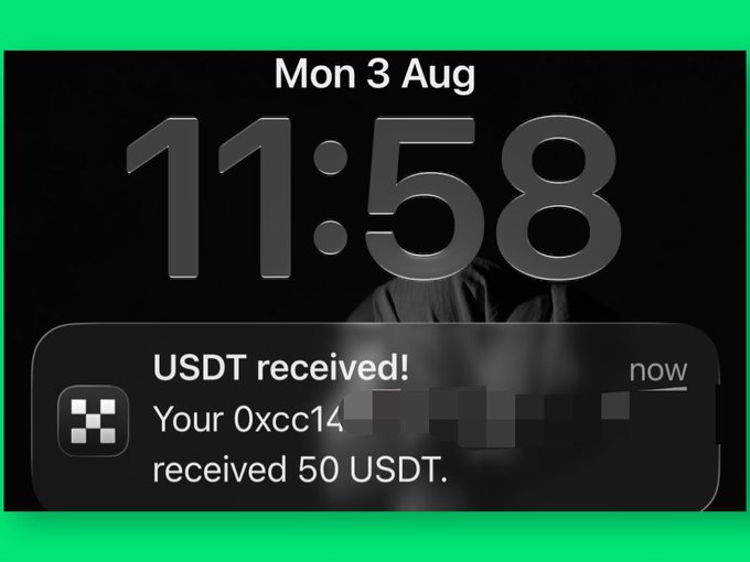 iPhone lock screen displaying the time 11:58 on Monday, August 3, with a notification stating "USDT received! Your 0xcc14... received 50 USDT."