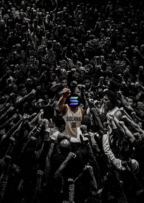 A basketball player wearing a "SOLANA" jersey stands with his fist raised in the air amidst a cheering crowd, mirroring the accompanying post's sentiment of "all eyes on Solana." The image visually represents widespread attention and support for Solana.