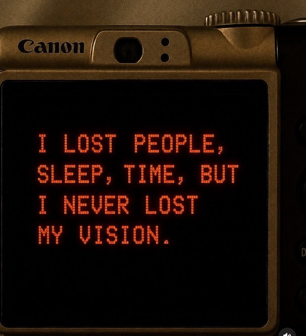 A Canon camera screen displays the motivational quote in red pixelated text: "I LOST PEOPLE, SLEEP, TIME, BUT I NEVER LOST MY VISION."