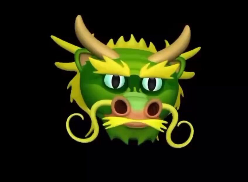 !!!Dragon face with yellow horns and green body, eyes closed, mouth open, and a mustache on the chin.
