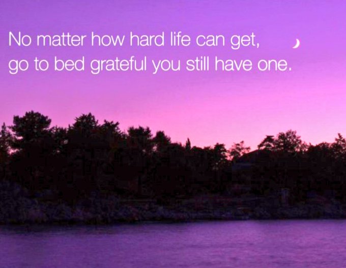 A purple twilight landscape with a crescent moon over a lake, featuring the inspirational text: 'No matter how hard life can get, go to bed grateful you still have one.'