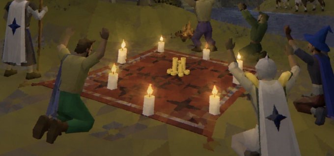 A scene from a video game showing characters in medieval-style clothing kneeling around a red rug decorated with stars, with lit candles placed at the corners and edges.
