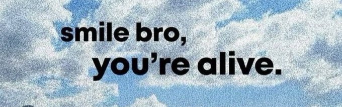 A motivational graphic displays the text 'smile bro, you're alive.' in bold black letters over a textured blue and white cloud-like background.